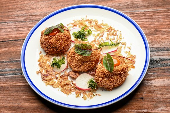 Prawn toast with lime mayo and crispy shallots.