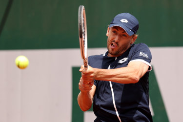 John Millman was bundled out of the French Open in the first round by Sebastian Korda.
