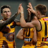 LAUNCESTON, AUSTRALIA - MAY 22: Chad Wingard of the Hawks celebrates with Dylan Moore of the Hawks during the 2022 AFL Round 10 match between the Hawthorn Hawks and the Brisbane Lions at UTAS Stadium on May 22, 2022 in Launceston, Australia. (Photo by Dylan Burns/AFL Photos via Getty Images)