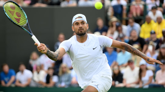 Nick Kyrgios plays a forehand against Paul Jubb of Great Britain during their Men’s Singles First Round Match at Wimbledon.