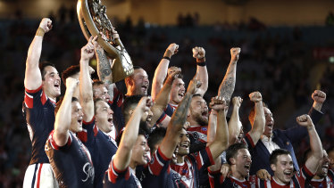 The Roosters celebrate the 2019 grand final win.