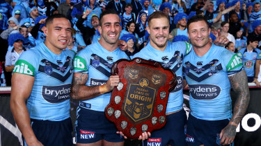 Jack de Belin (second from right) with former and current Dragons teammates Tyson Frizell, Paul Vaughan and Tariq Sims after NSW’s 2018 State of Origin win.