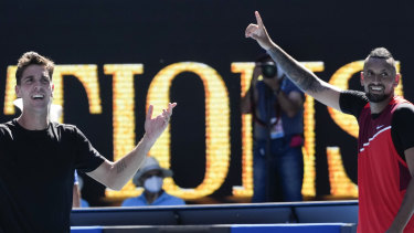 Nick Kyrgios and Thanasi Kokkinakis celebrate after winning their semi-final. 