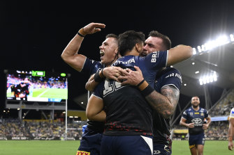 Jeremiah Nanai celebrates a try against the Titans.