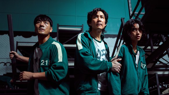 Hae-soo Park as banker Sang-woo, Jung-jae Lee as Gi-hun and Hoyeon Jung as Sae-byeok.