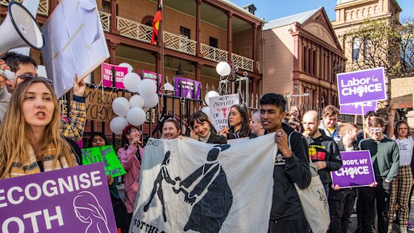 Supporters and opponents of the bill to decriminalise abortion rallied outside NSW Parliament on Tuesday.