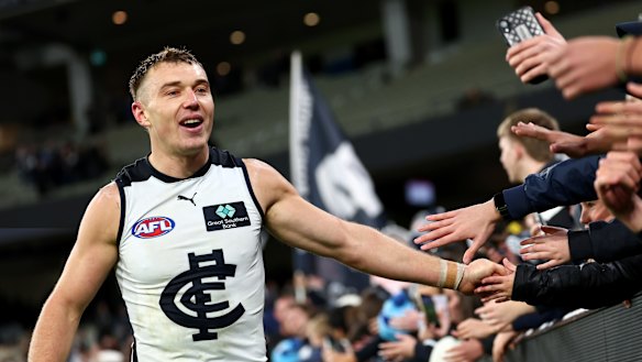Patrick Cripps celebrates a narrow win for the Blues.