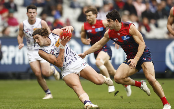 Luke Jackson in action under pressure on Saturday at the MCG.