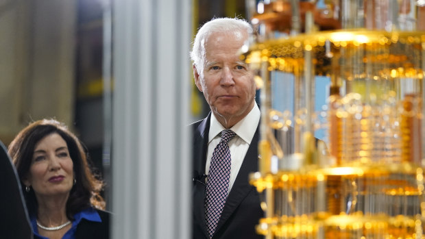 US President Joe Biden looks at the IBM System One quantum computer with New York Governor Kathy Hochul during a tour of an IBM facility in Poughkeepsie.