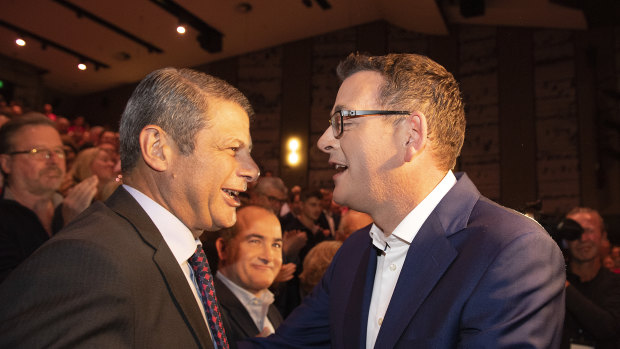 Victorian Premier Daniel Andrews greets former premier Steve Bracks 