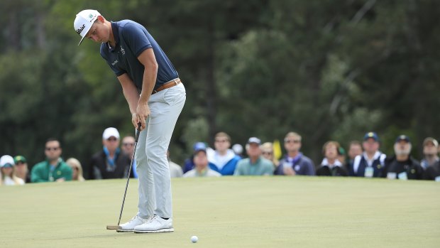 Flush finish: Cameron Smith of Australiia putts on the first hole during the final round of the 2018 Masters.