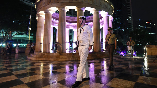 Members of the armed forces are seen during Anzac Day commemorations in Brisbane.