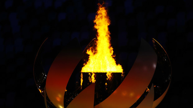The Olympic Flame is seen before the Closing Ceremony of the Tokyo 2020 Olympic Games at Olympic Stadium.