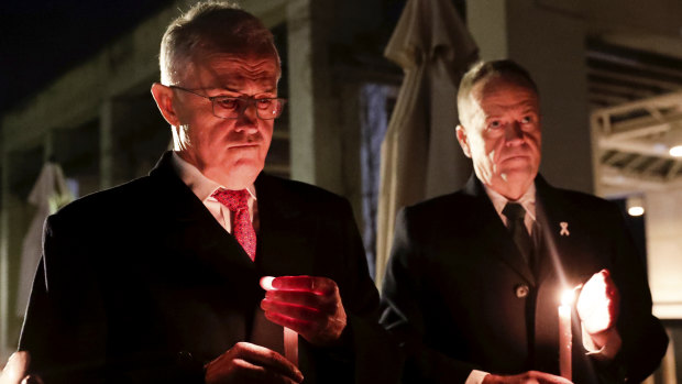 Prime Minister Malcolm Turnbull and Opposition Leader Bill Shorten attend a candlelight vigil for Eurydice Dixon, at Parliament House in Canberra.