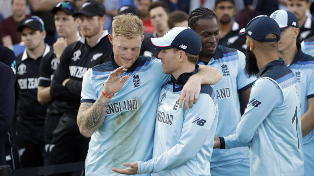 Ben Stokes and Eoin Morgan embrace after their thrilling victory at Lord's.