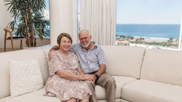 Keith and Glenda Drake in their Maroochydore penthouse, which they're auctioning off to raise funds for the Royal Brisbane and Women's Hospital Coronavirus Action Fund. 