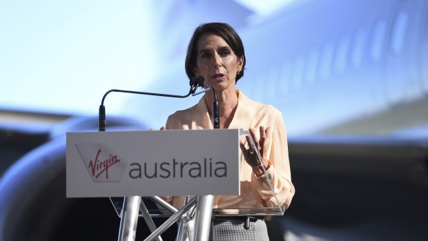 Virgin Australia CEO Jayne Hrdlicka speaks during a media event at the Virgin maintenance hangar at Brisbane Airport.