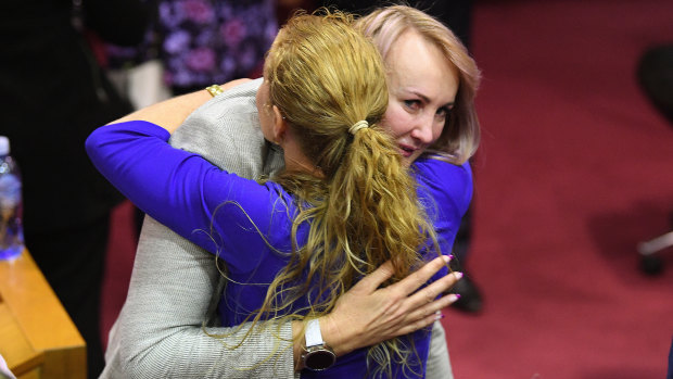 Cr Cheryl Bromage (right) is consoled following the council's final meeting.