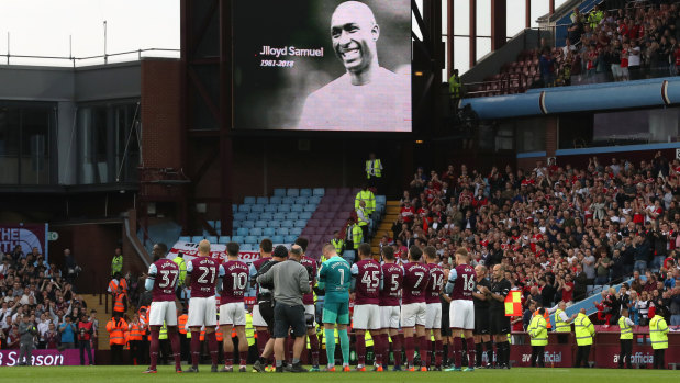 Minutes applause: Fans and players before the match as Samuel's face appeared on the big screen.