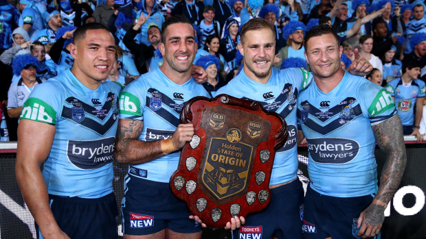 Jack de Belin (second from right) with former and current Dragons teammates Tyson Frizell, Paul Vaughan and Tariq Sims after NSW’s 2018 State of Origin win.