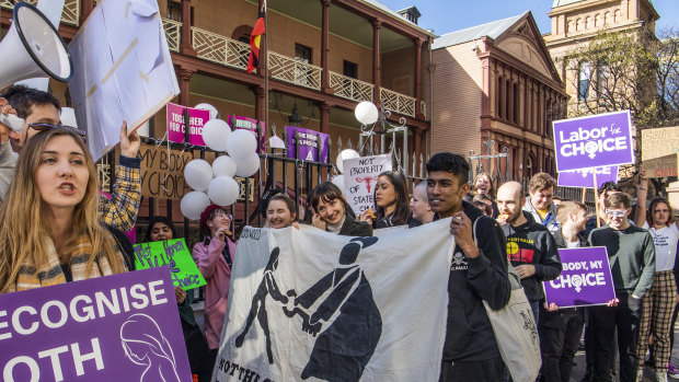 Supporters and opponents of the bill to decriminalise abortion rallied outside NSW Parliament on Tuesday.