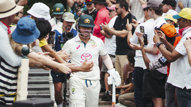 David Warner walks out to bat for the final time in Test cricket.