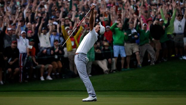 A jubilant Adam Scott celebrates his 2013 Masters win on the second play-off hole at Augusta National.