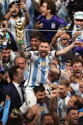 Lionel Messi celebrates Argentina’s World Cup victory with fans in Qatar.