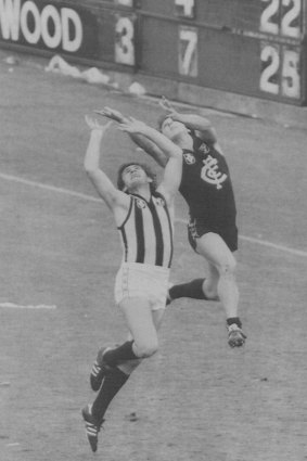 Then Pie Craig Davis flies with Carlton’s Wayne Harmes for the ball in the 1981 grand final.