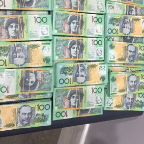 Around $400,000 in cash was seized during  police search warrants executed on Thursday.
