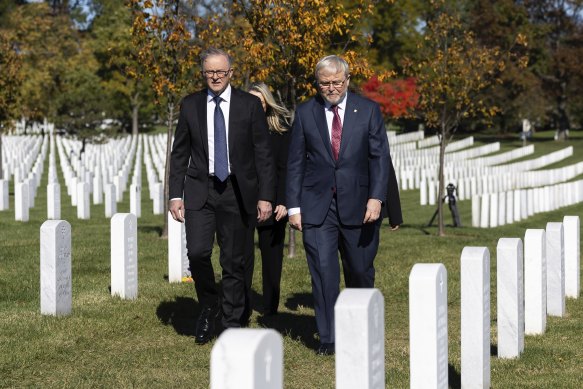 Prime Minister Anthony Albanese and US ambassador Kevin Rudd at a wreath laying ceremony in Washington on Monday.