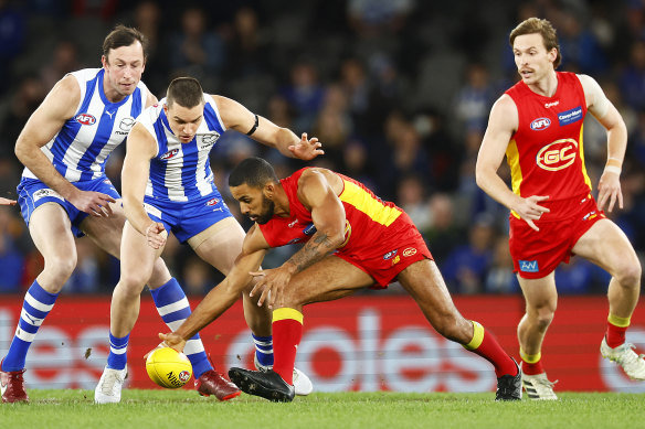 Touk Miller grabs the ball for Gold Coast.