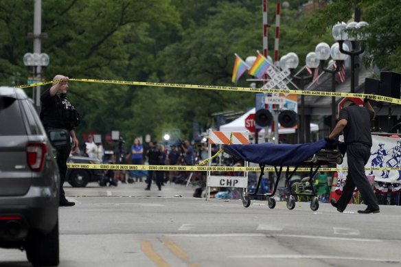 A stretcher is seen after a mass shooting at the Highland Park Fourth of July parade.