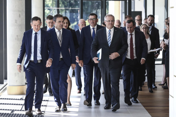 Michael Gunner (NT), Steven Marshall (SA) , Annastacia Palaszczuk, (Queensland), Daniel Andrews (Victoria), Scott Morrison and Mark McGowan (WA) walk out of the COAG meeting in Parramatta.