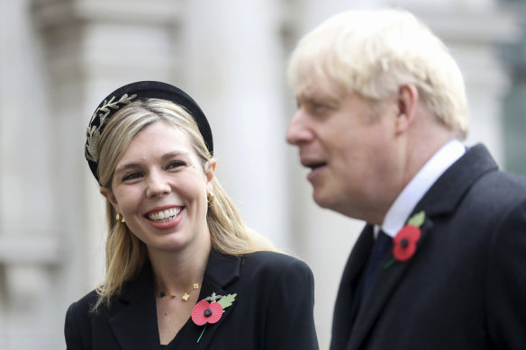 Britain's Prime Minister Boris Johnson, right, with partner Carrie Symonds.