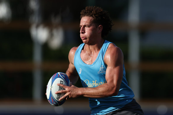 Mark Nawaqanitawase runs the ball during a Wallabies training session ahead of the Rugby World Cup.