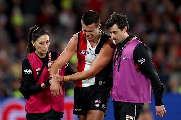 Jack Silvagni leaves the ground with a dislocated shoulder.