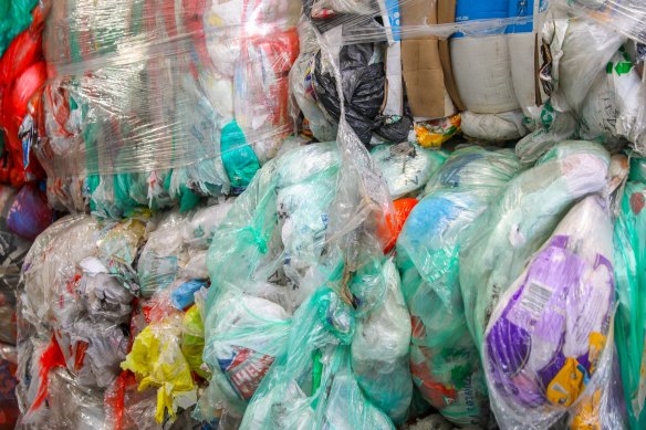 Plastic bags stockpiled in a Sydney warehouse. Nearly 12,400 tonnes of soft plastics have now been found in 32 locations across three states.