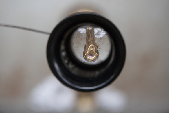 The World Cup during a phase of drying, seen through the eyepiece lens for engraving.