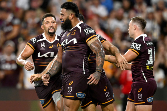 Payne Haas celebrates scoring for the Brisbane Broncos against the North Queensland Cowboys.