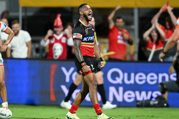 Hamiso Tabuai-Fidow celebrates for the Dolphins against the Dragons.