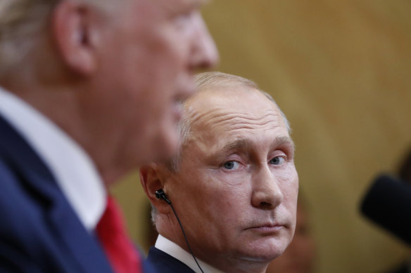 Russian President Vladimir Putin with then president Donald Trump in 2018. 