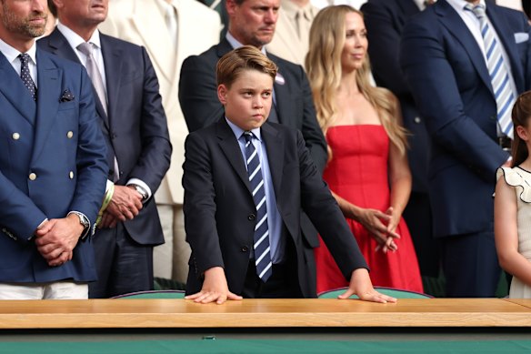 Tied down … Prince George at Wimbledon.