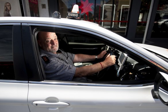Sam Hipsz with his taxi in Centre Road, Bentleigh near the train station: “More people are out and about... which is great to see.” 
