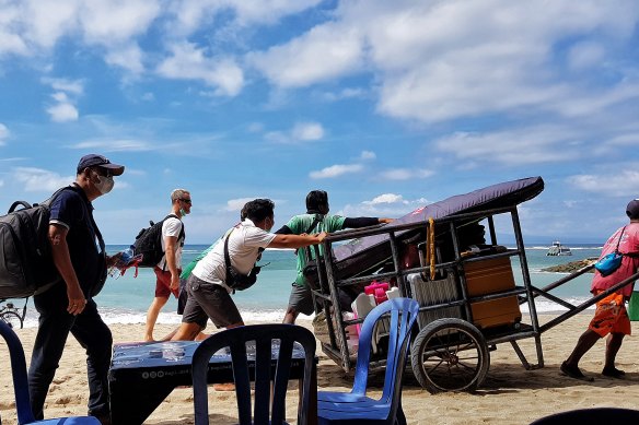 Tourists at Sanur preparing to take a speed boat to the island of Nusa Lembongan this week.