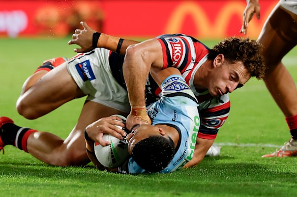 Mark Nawaqanitawase roughs up Ronaldo Mulitalo in Gosford earlier this season.