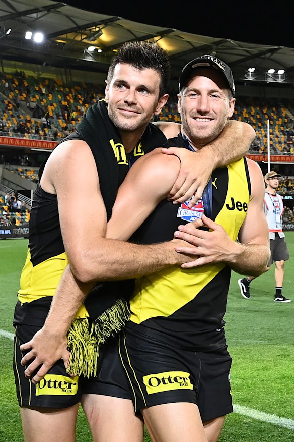 Trent Cotchin, pictured left with Kane Lambert after Richmond’s 2020 grand final win, was a revered captain.