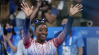 Simone Biles was all smiles after her routine.