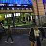 Police tape outside Flinders Street Station on Saturday night.