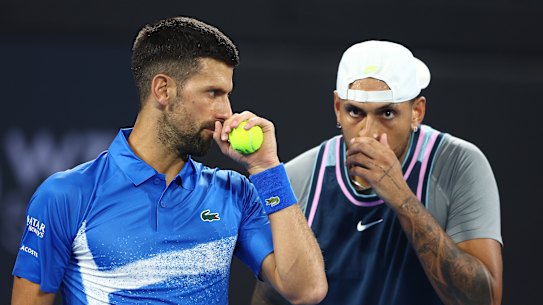 Novak Djokovic and Nick Kyrgios play doubles together in Brisbane.